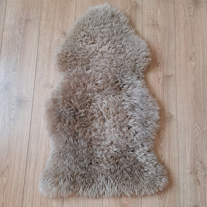 Коврик Ikea,  овечья шкура, овчина 1метр× 55 см  практически новый.