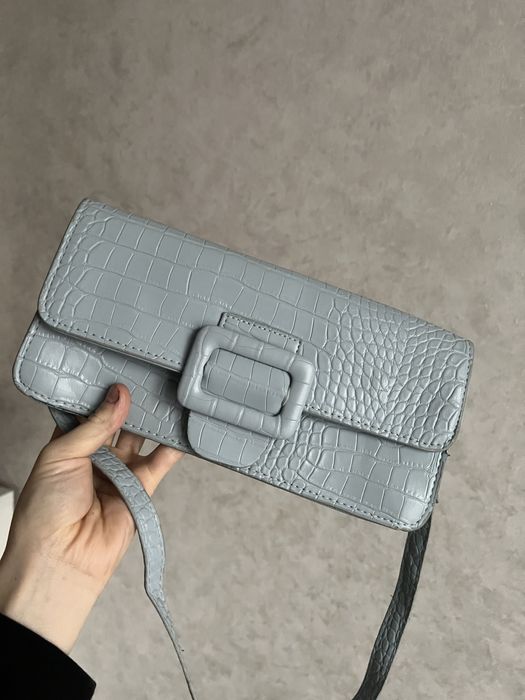 Сумка-клатч голубого кольору