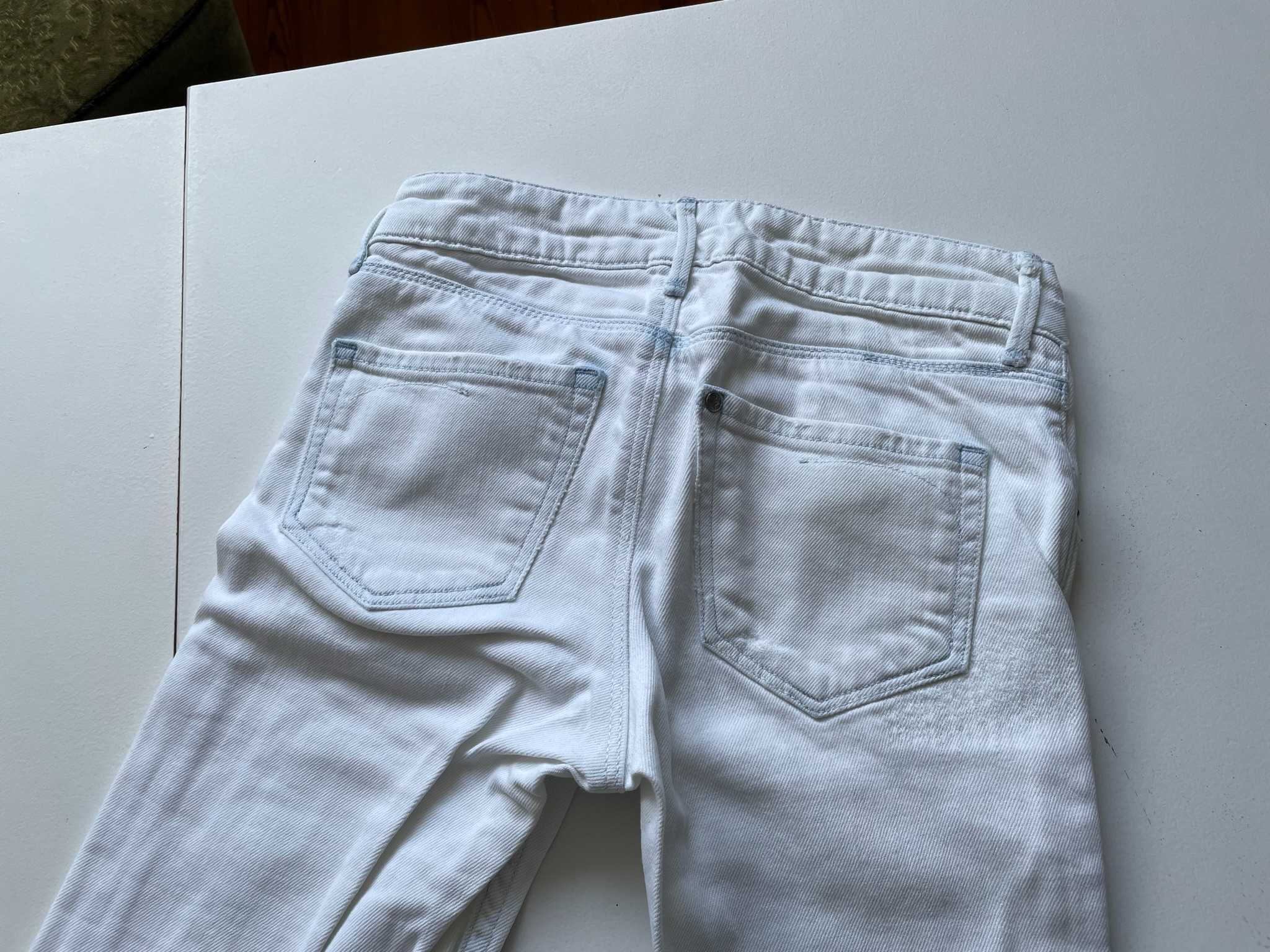 H&M białe jasne dżinsy jeansy rurki z przetarciami r. 140