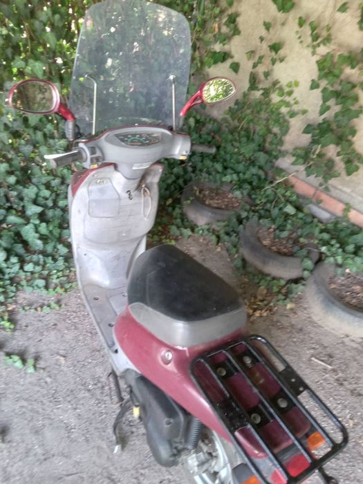 Продам скутер Ноnda  Topik, на ходу. С прицепом