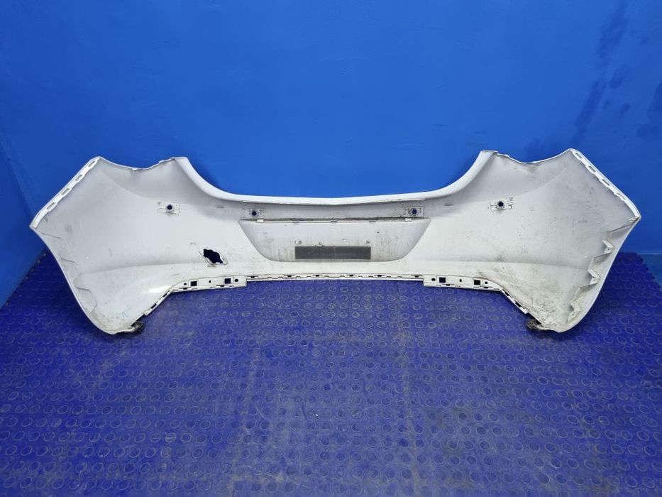 ZDERZAK tylny OPEL Astra J tył 4 PDC Oryginał