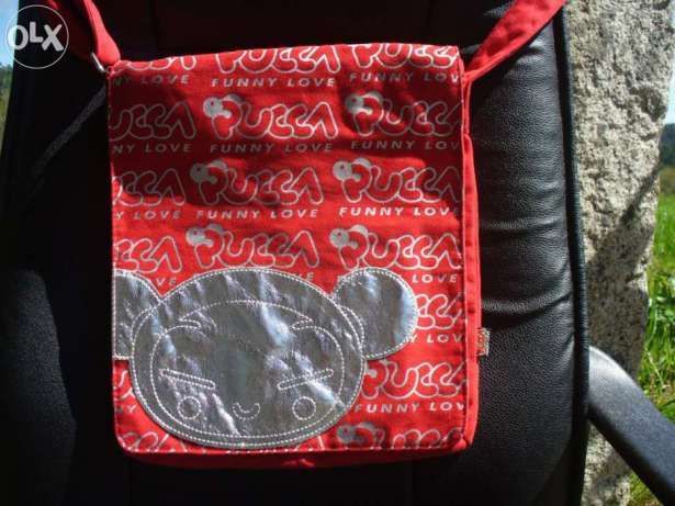 pasta em tecido, vermelha da marca Pucca