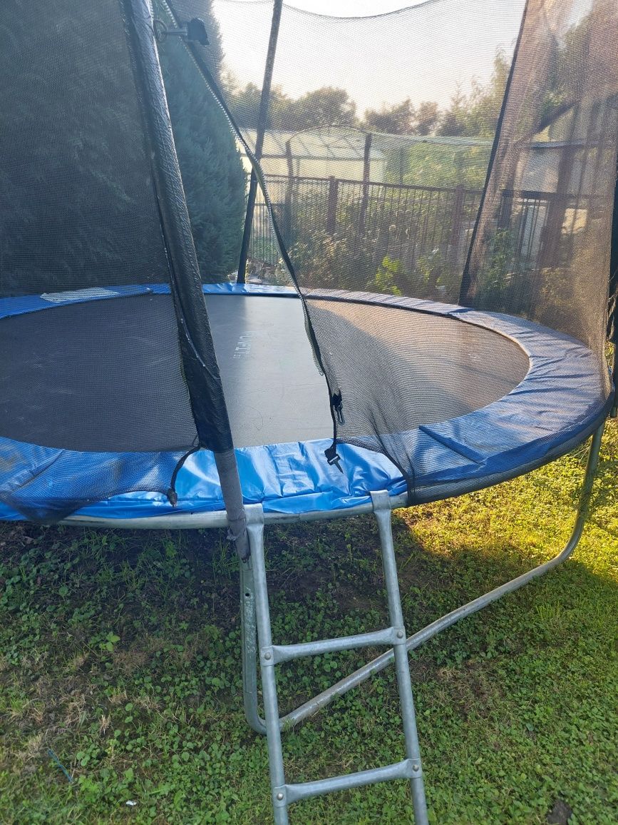 Trampolina stan bardzo dobry,  312 cm .