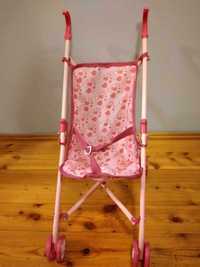 Różowy wózek dla lalek