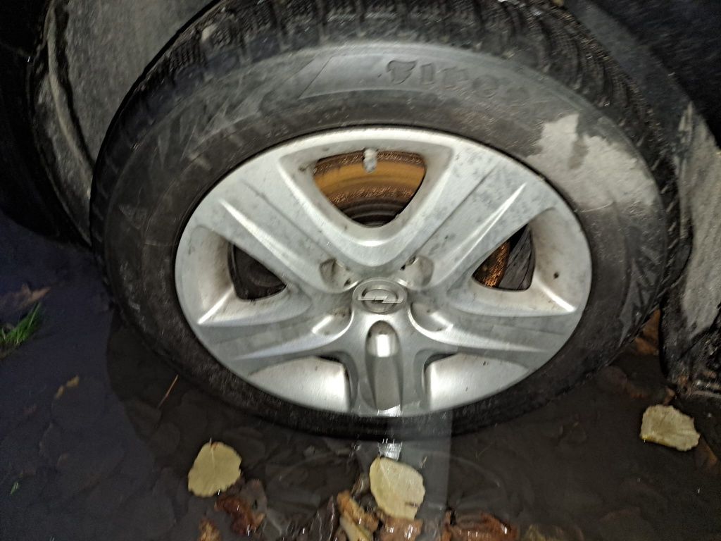 Komplet kół z kołpakami Opel OE 7.0" x 16" 5x110