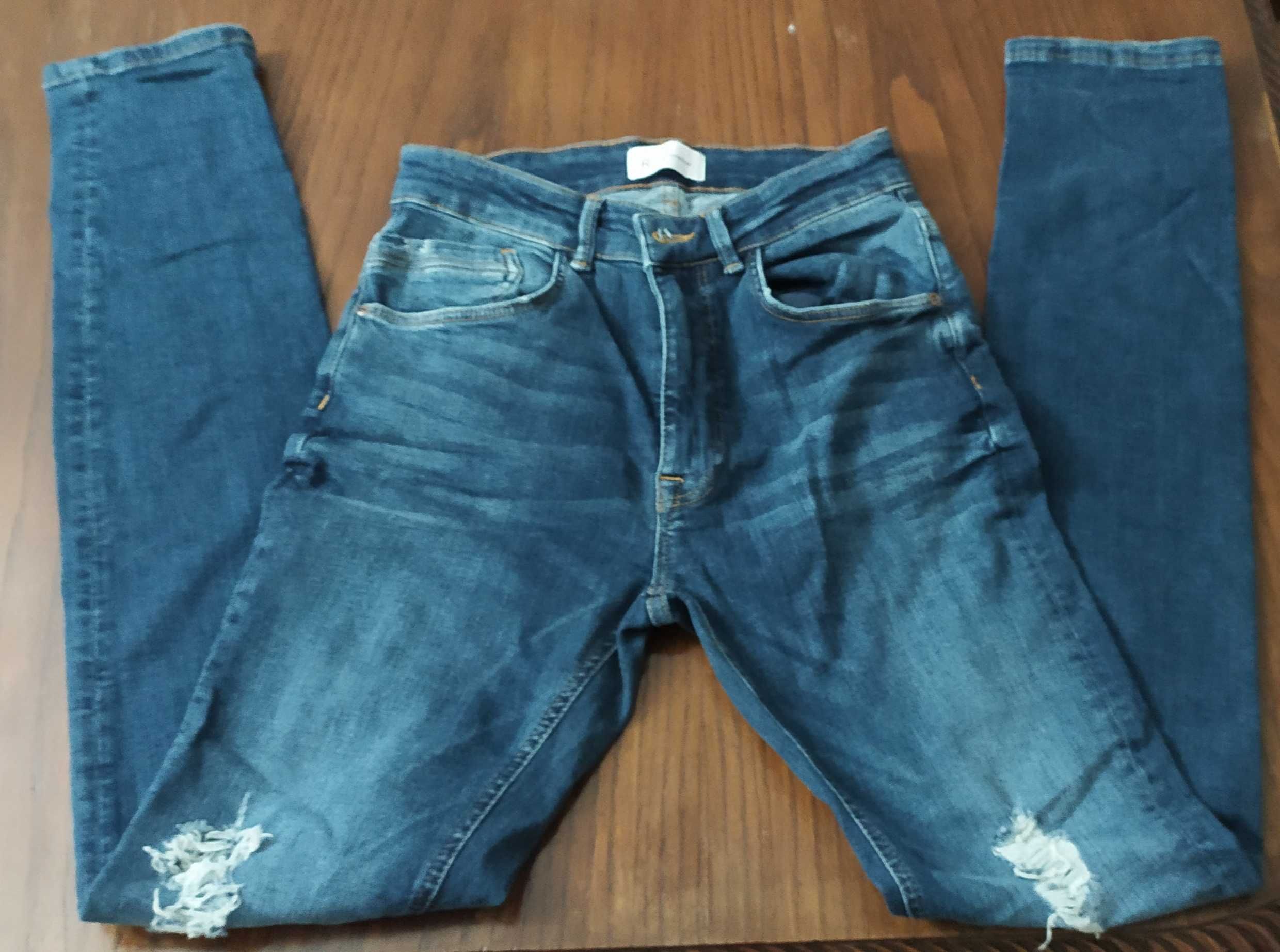 Jeans Slim Fit (efeito rasgado) - Novas