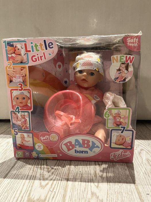 Lalka Baby born Little girl 36cm + ubranka BB i plecak BB, super stan