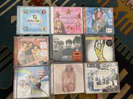 CDs música (beatles, jlo,u2,panda, doce mania)