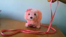 Cachorrinho a pilhas cor-de-rosa