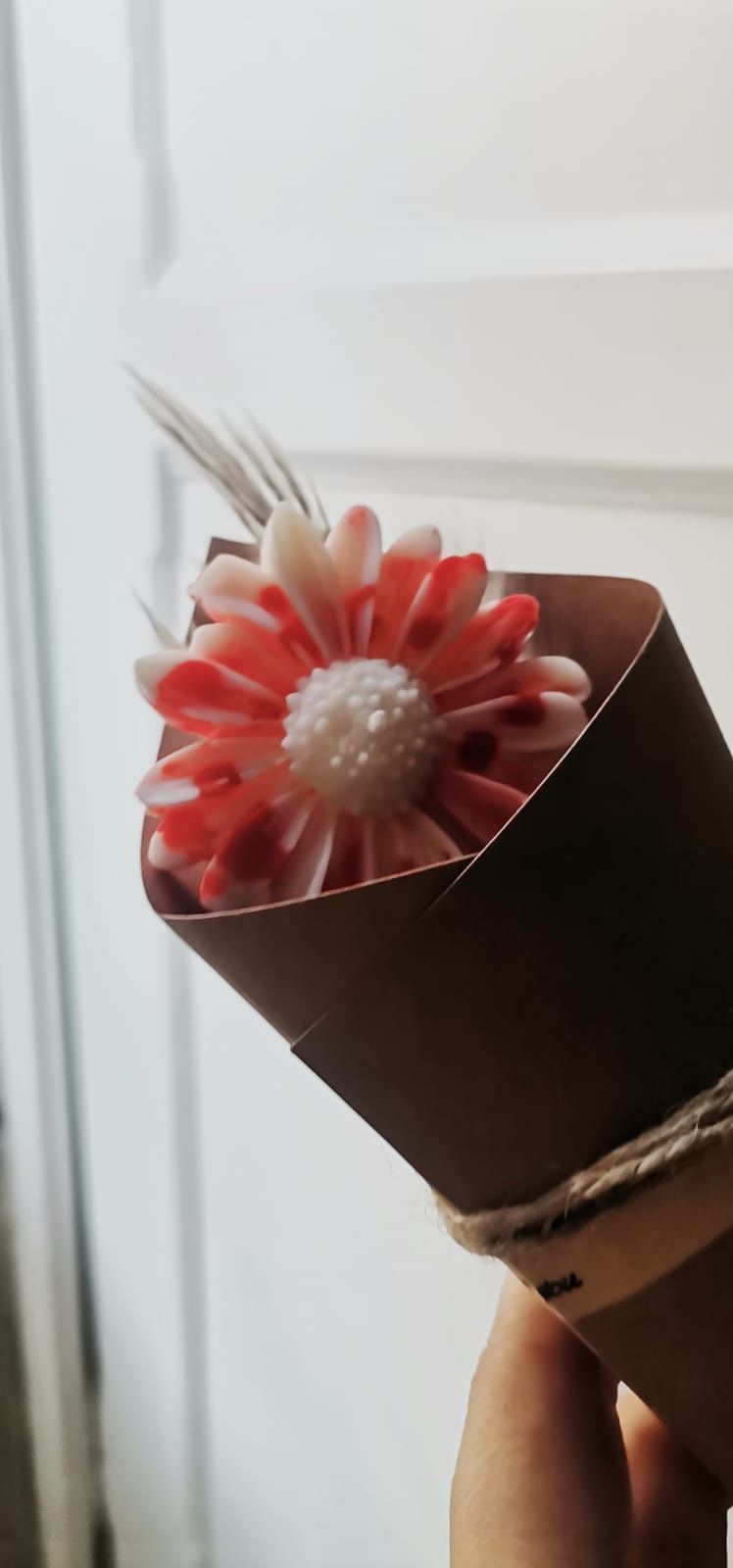 Ramo de flores com velas