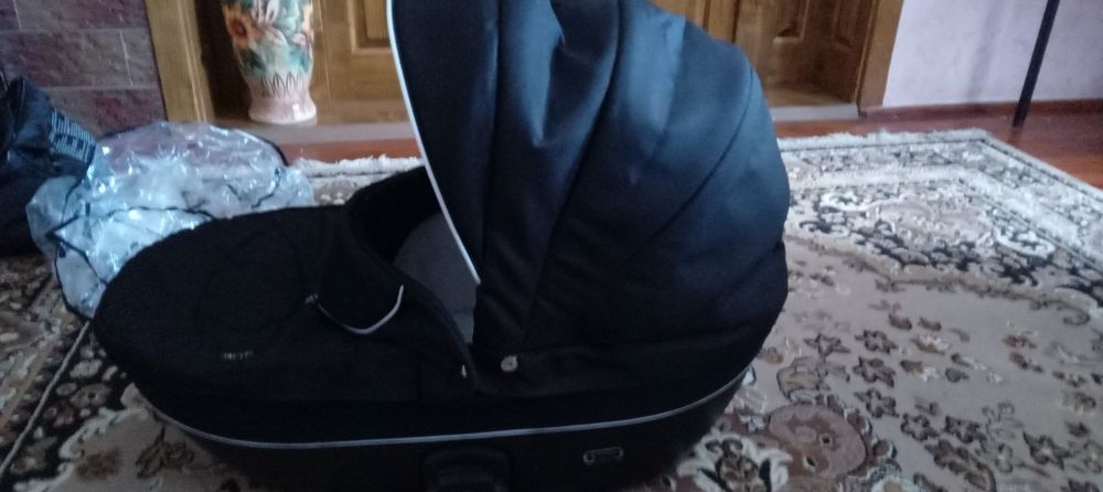 Продам люльку,і дощьовик.