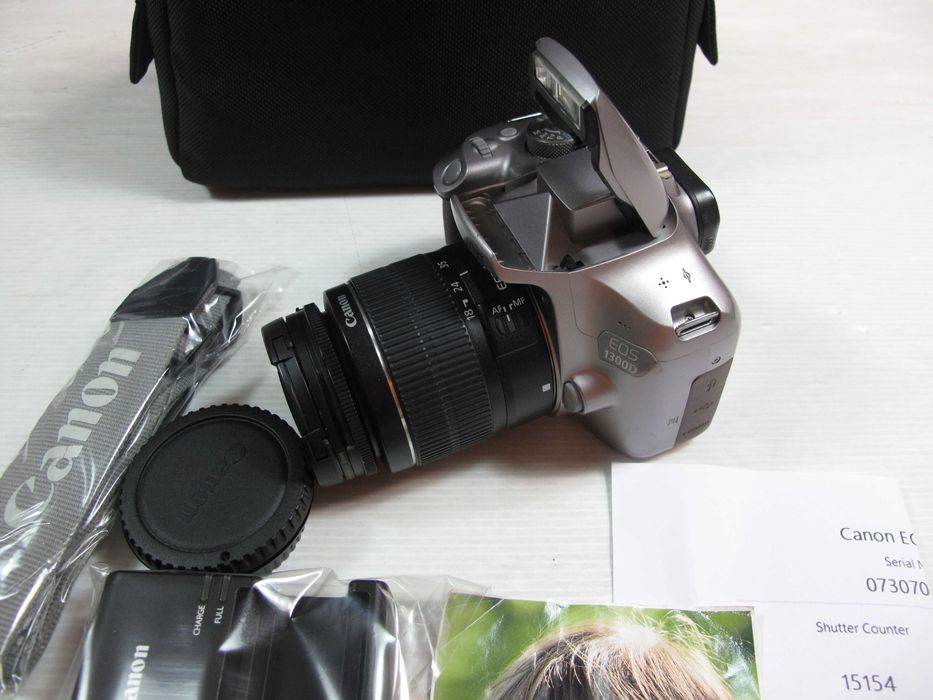 canon 1300D+18-55 só 15 mil disparos como NOVA