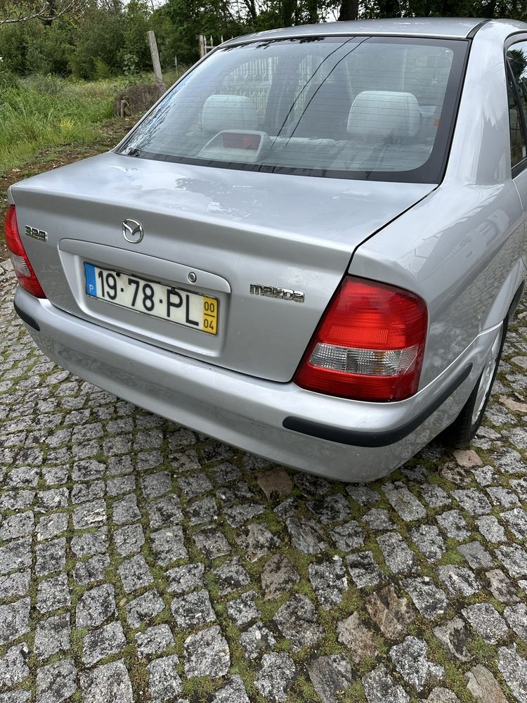 Mazda 323 125mil km