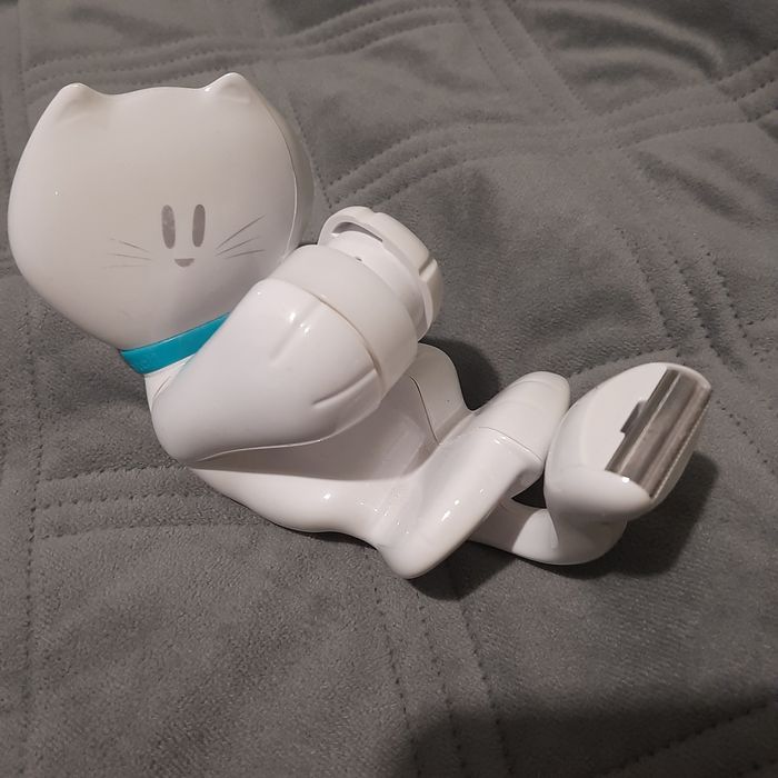 Podajnik na taśmę klejącej kotek