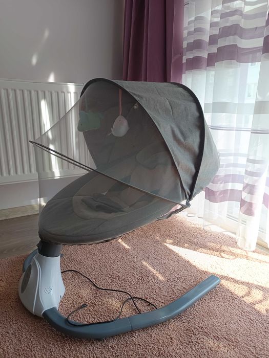 Дитяча електрична гойдалка