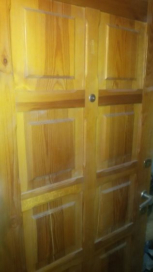 drzwi drewniane podwójne z podwójnym zamkiem