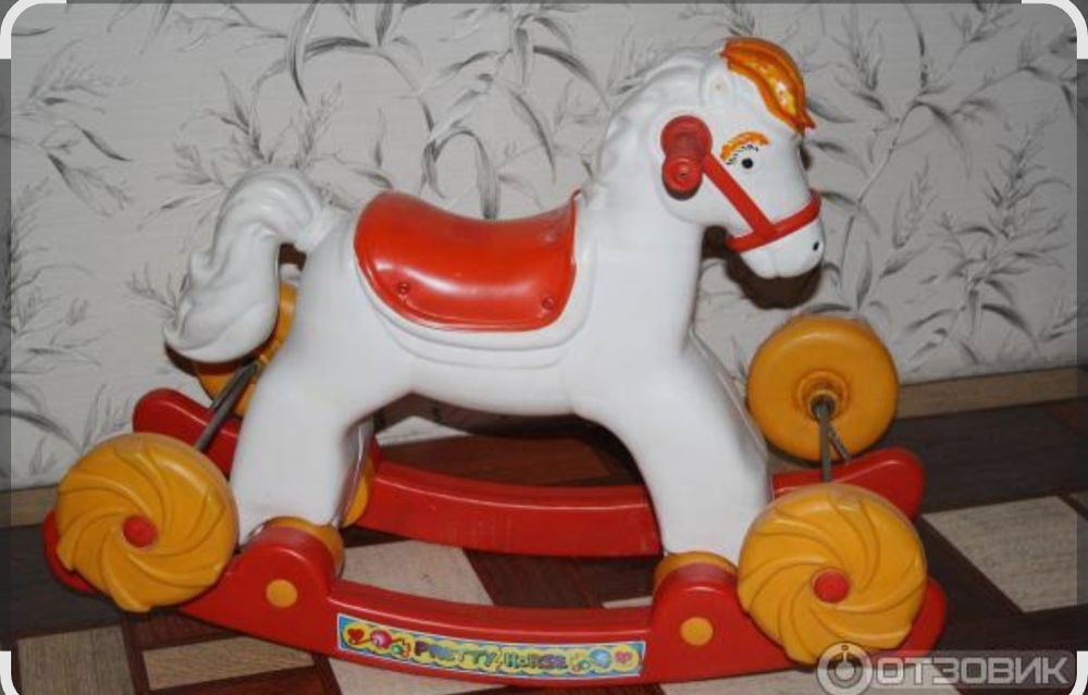 Лошадка качалка на колесах.