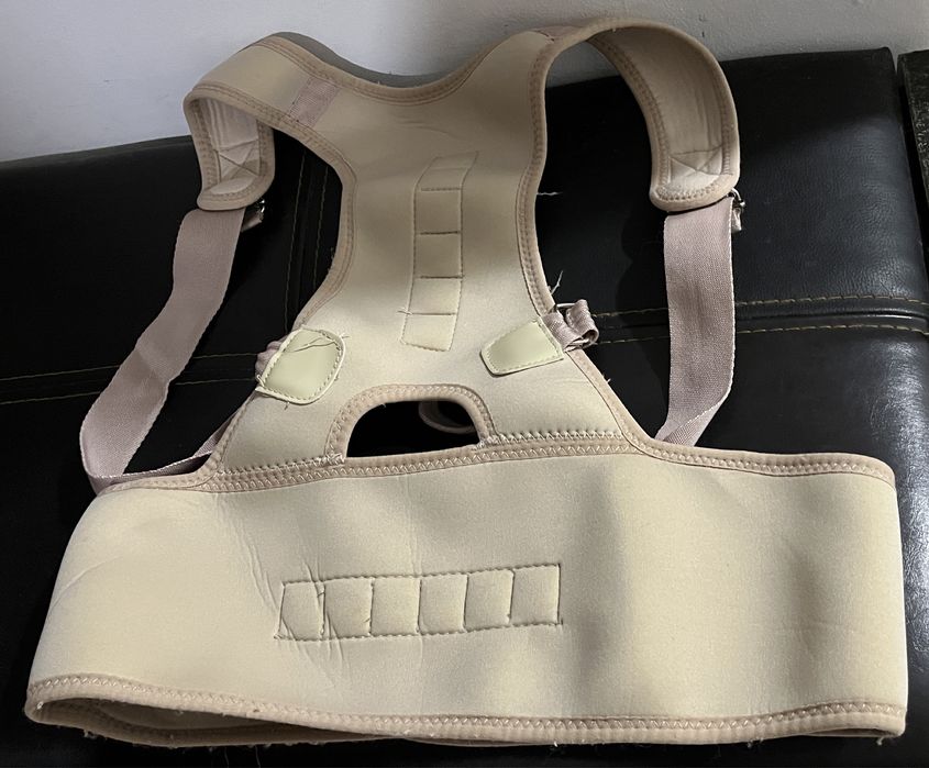 Colete corretor de portura