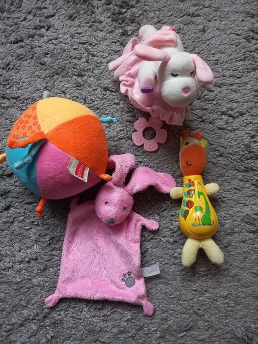 Zabawki dla niemowląt:interaktywna żyrafa ,piesek z pozytywką