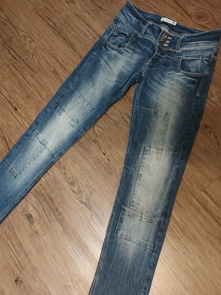 Spodnie jeansowe damskie Terranova