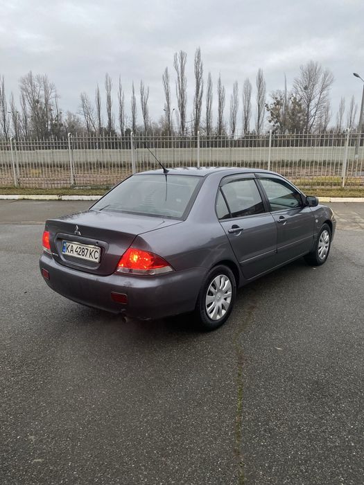 Mitsubishi Lancer 9 1.6 газ4 автомат