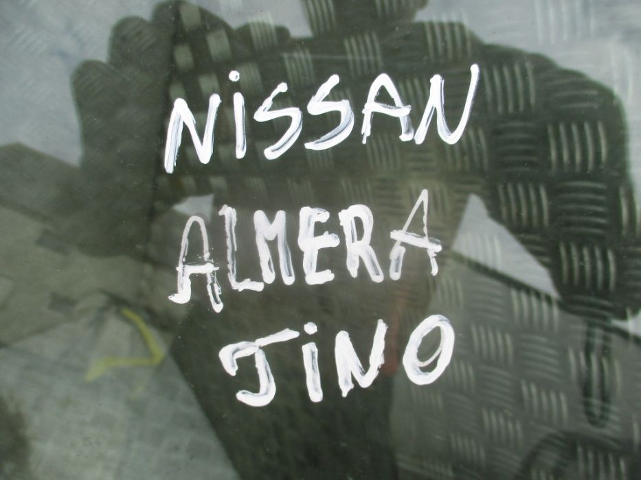 Drzwi tył prawy srebrne Nissan Almera Tino