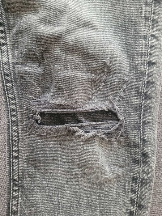 Spodnie jeans spodnie dżinsowe Zara 42 z rozdarciami