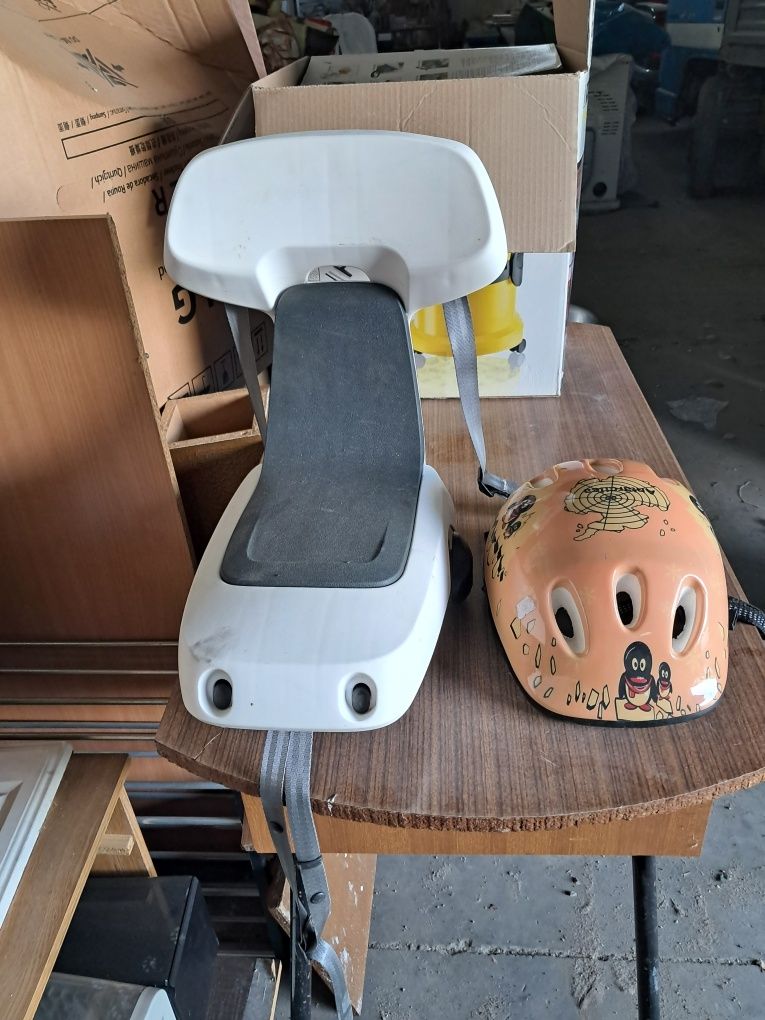 Cadeira de criança para bicicleta e capacete
