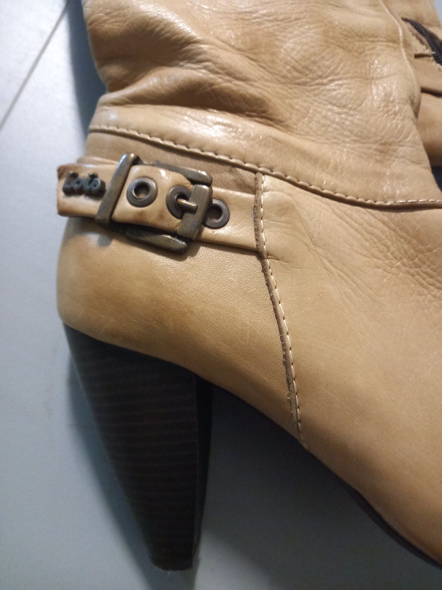 Botas cano alto com tacão