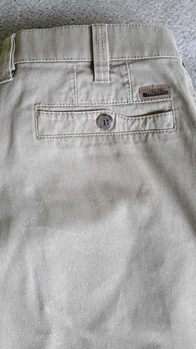 Eleganckie sportowe   spodnie męskie M pas 86 cm