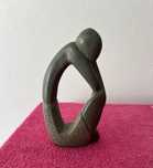 Estatueta em pedra polida (abstrata)