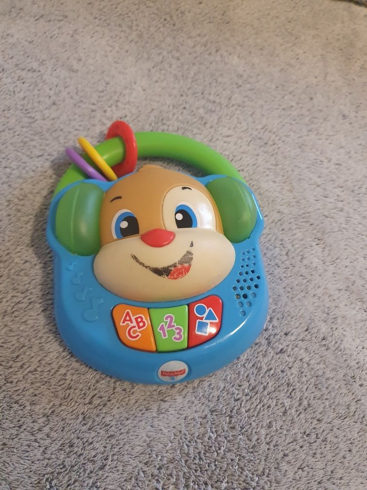 Muzyczny odtwarzacz szczeniaczka Fisher Price