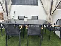 Mesa e cadeiras de jardim