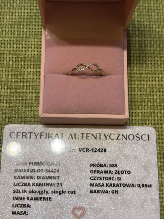 Złoty pierścionek z brylantami 585 r.14