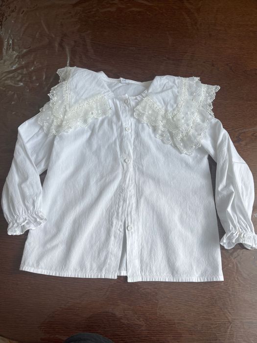 Біла блузка для дівчинки