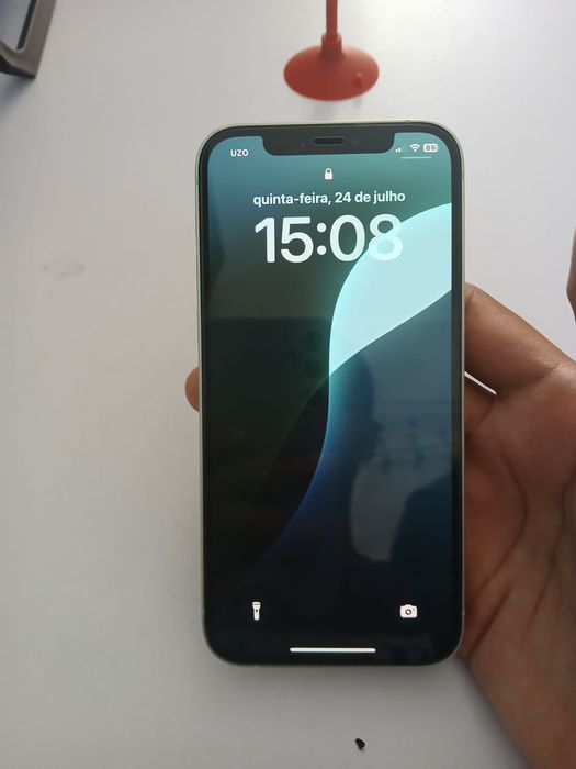 iPhone 12 IOS 26 em estado DE novo. 3 capinhas, cooler