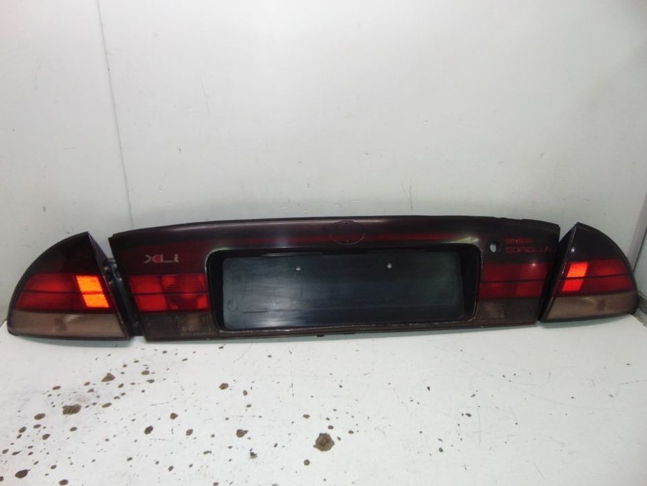 Toyota corolla xli farolins /Placa central