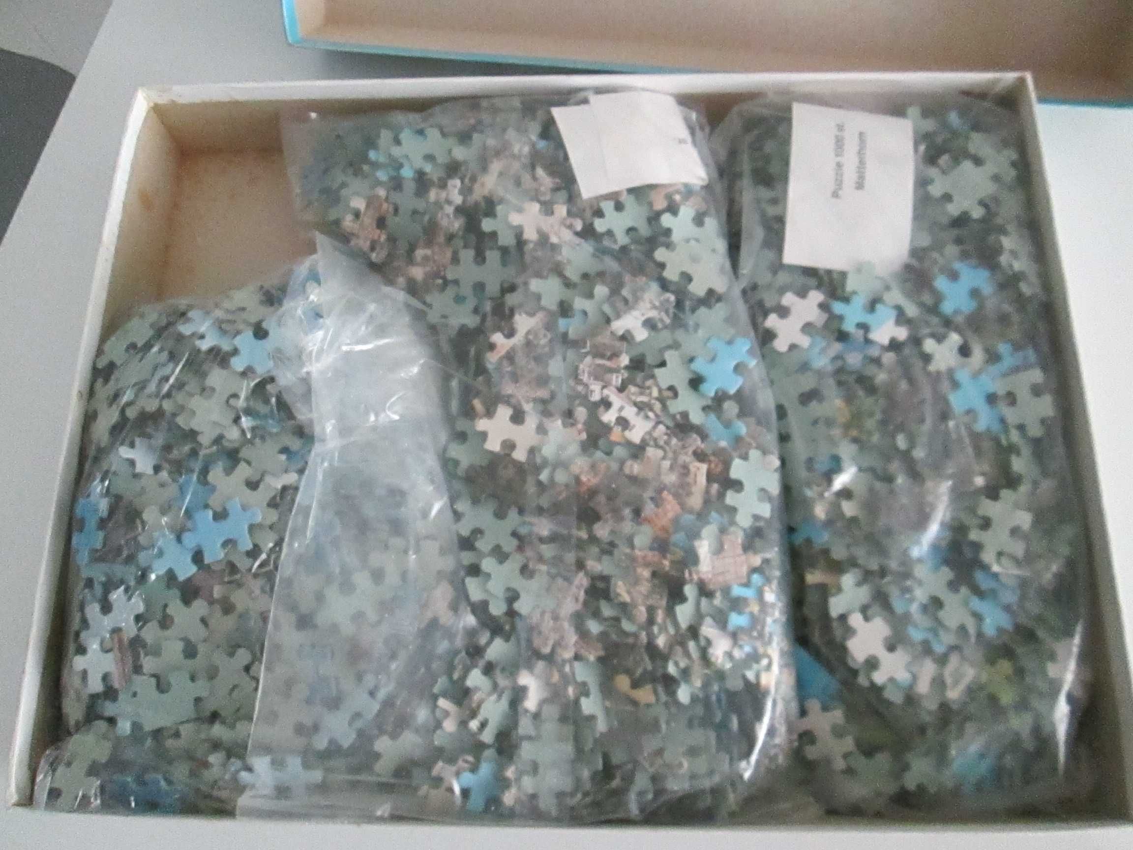 3 puzzles de 1000 peças cada numa só caixa