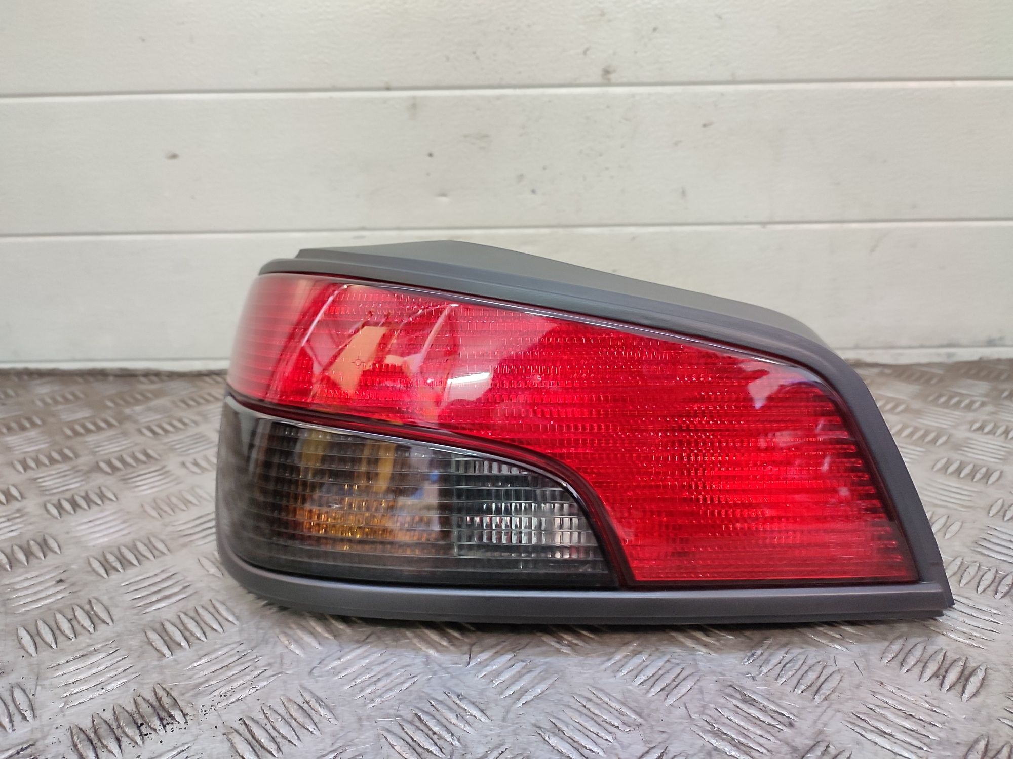 Peugeot 306 lampa lewa lewy tył tylna