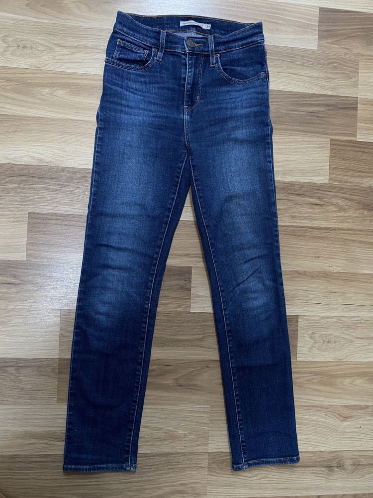 Jeansy 34 Levi Strauss wysoki stan lekko elastyczne proste nogawki