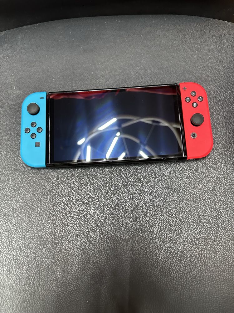 Nintendo Switch Oled з майже всіма іграми