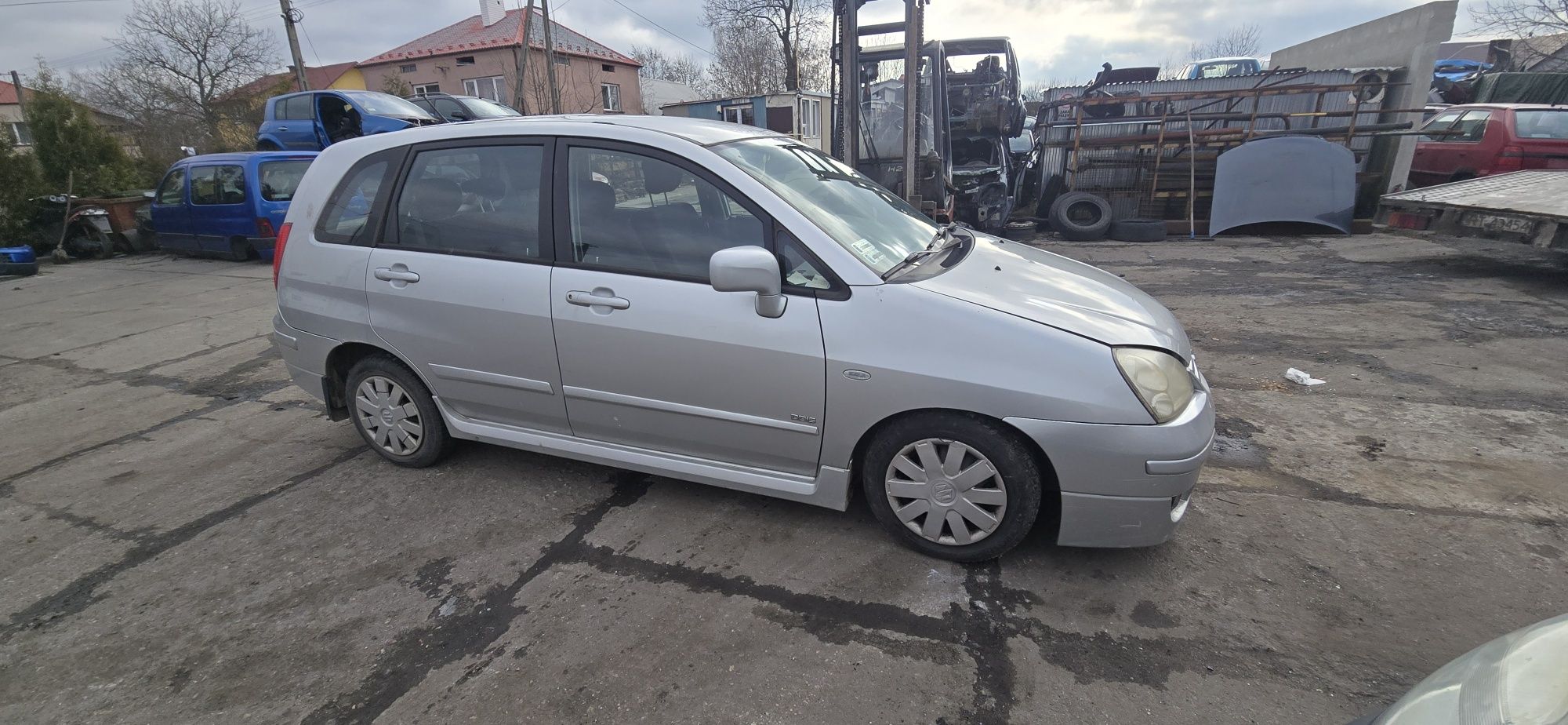 Drzwi maska klapa zderzak   Z2S DO2 lampa  Suzuki Liana 1,4 części