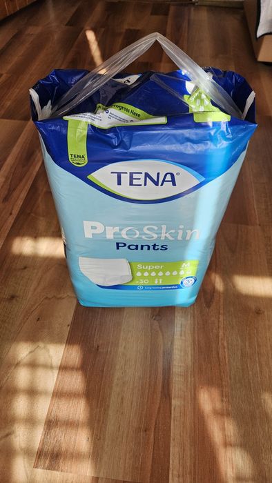 Tena Pants M , L