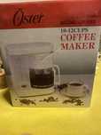 Máquina de cafe oster nova