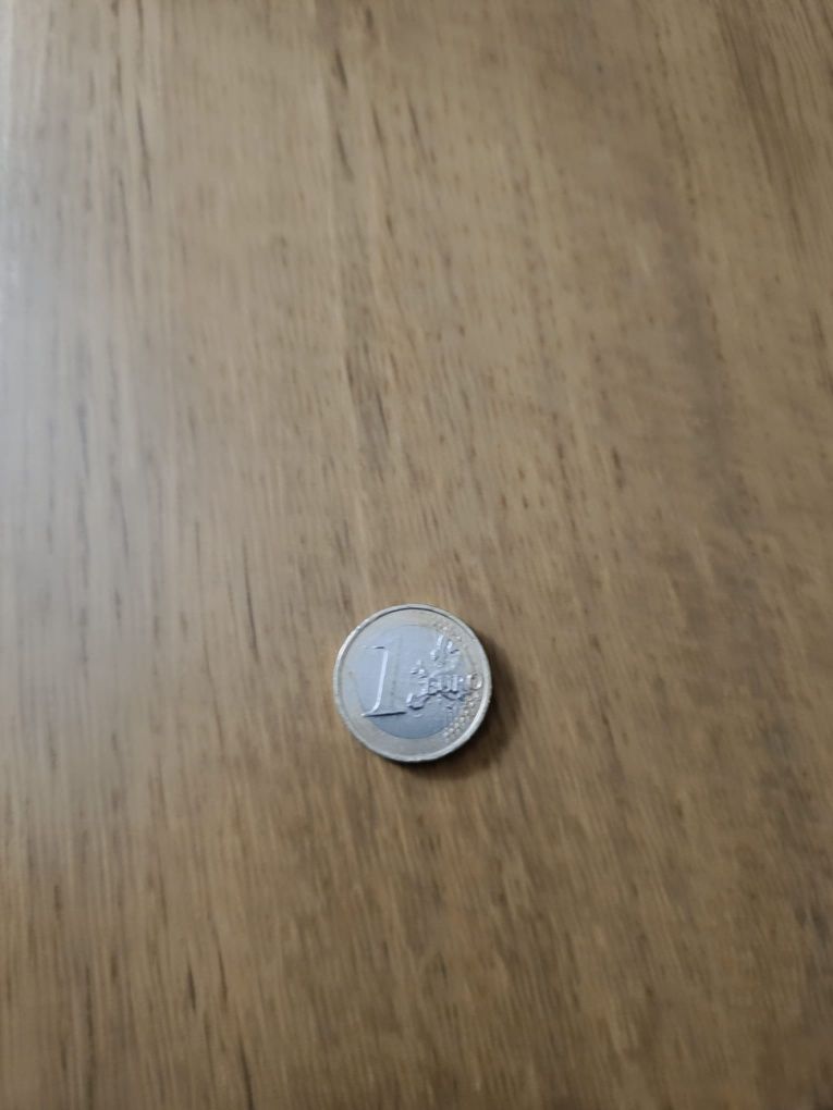 Moedas de 2002 de 1€ da Eslováquia e de 2009 de 0,50€ da Itália