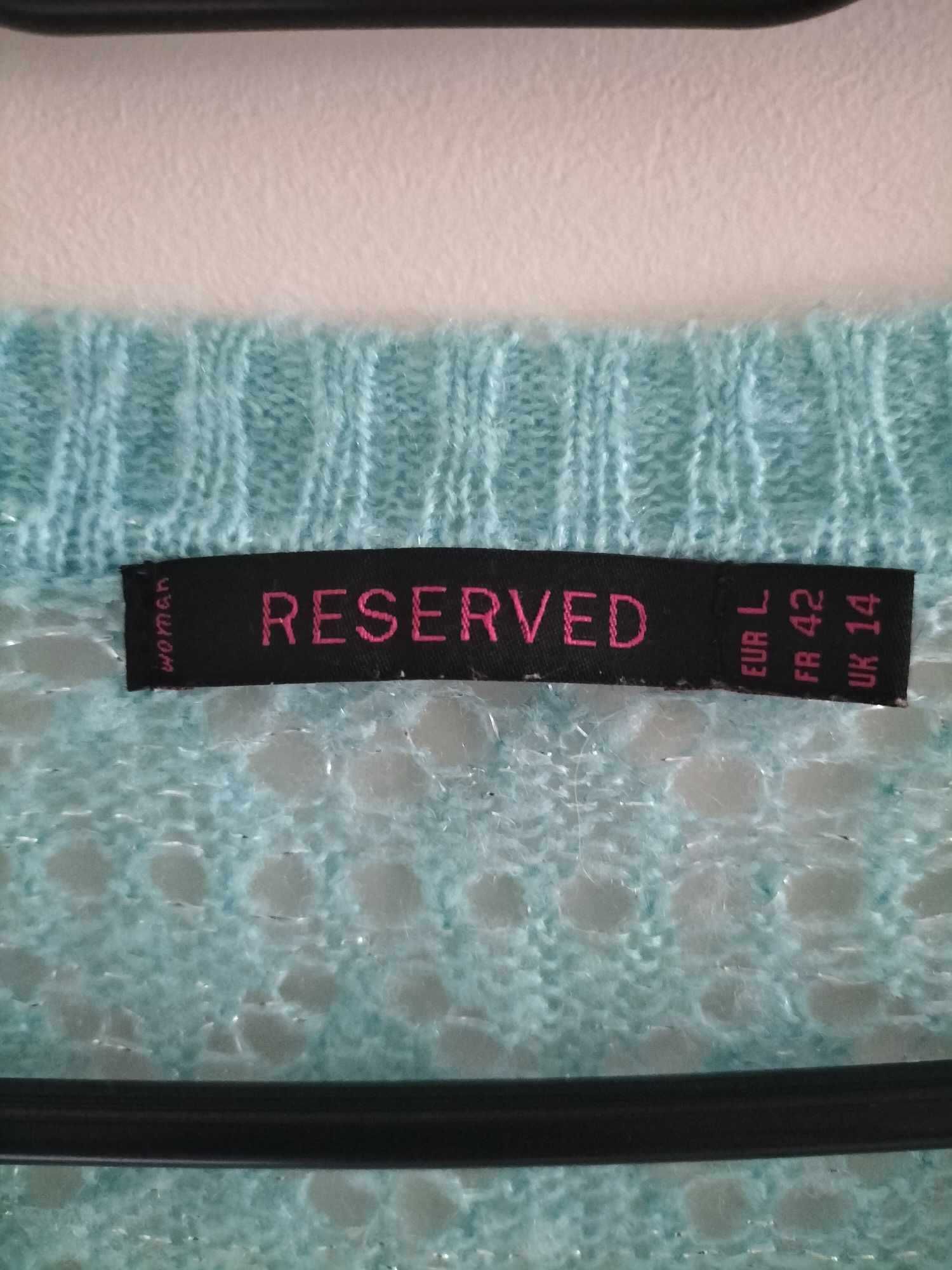 Ażurowy sweterek Reserved