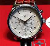 zgarek męski z napisem TISSOT