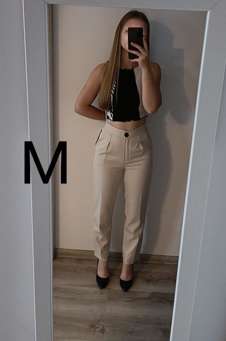 Beżowe spodnie garniturowe damskie eleganckie M nowe
