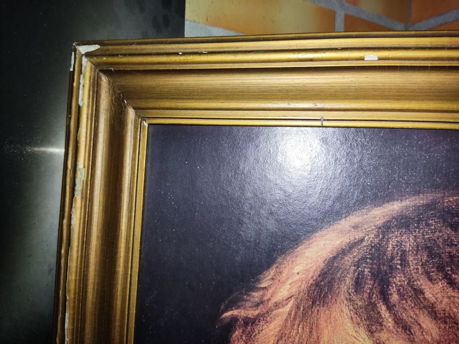 Quadro antigo com menino