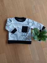 Bluza chłopięca biała czarne wstawki dinozaury r.68 Reserved